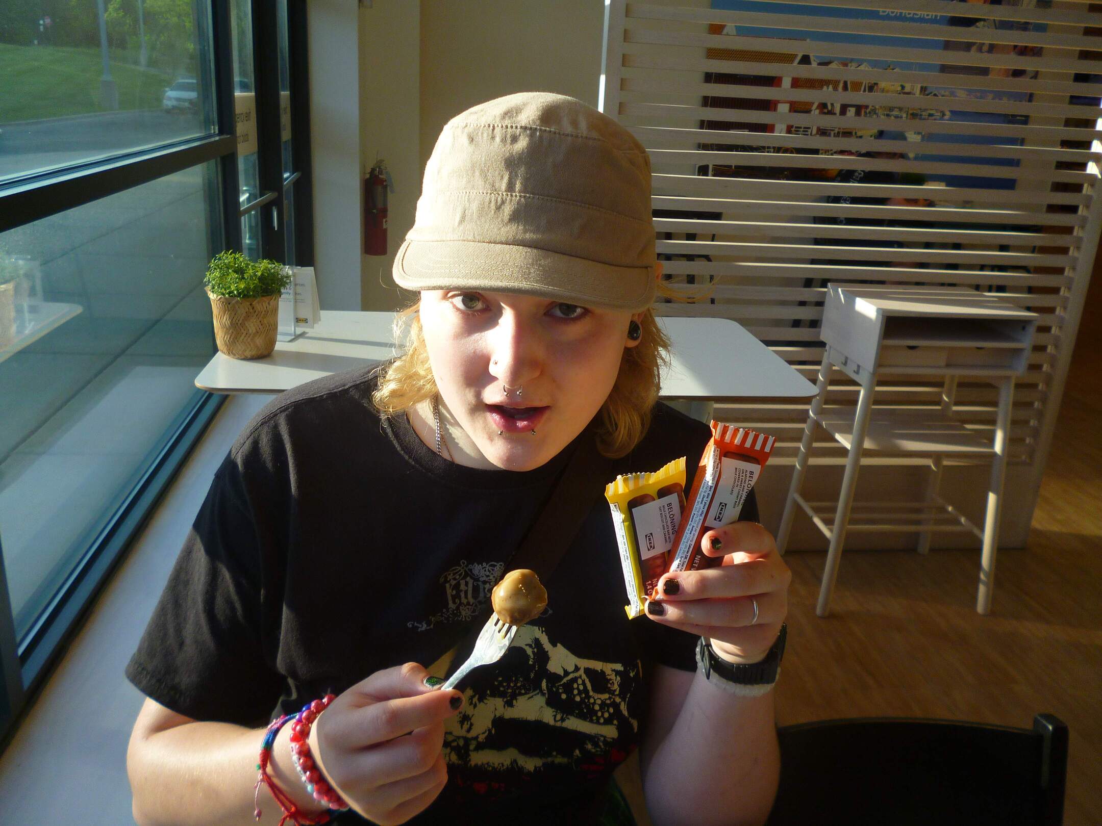 Katie with Ikea candy and swedish meatball at Ikea.