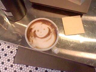 poorly done latte art by yours truly.